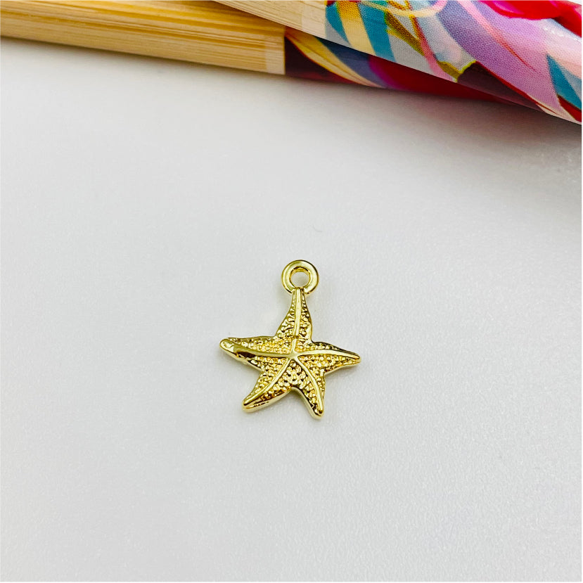 FO882 Colgante Estrella de Mar 10x10 mm más argollita Figura Baño Oro Figuras Bañadas en Oro y Plata hecho de Bronce Bañado en Oro 18K Joyas Bañadas en Oro