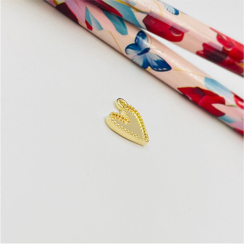 FO889 Colgante Mini Corazón ladeado con borde reticulado 9 mm más argollita Figura Baño Oro Figuras Bañadas en Oro y Plata hecho de Bronce Bañado en Oro 18K Joyas Bañadas en Oro