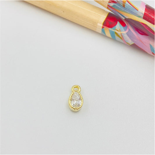 FO974 Colgante Punto de Luz Gota Borde Acanalado 5x3 mm mas argollita Figura Baño Oro Figuras Bañadas hecho de Bronce Bañado en Oro 18K Joyas Bañadas en Oro