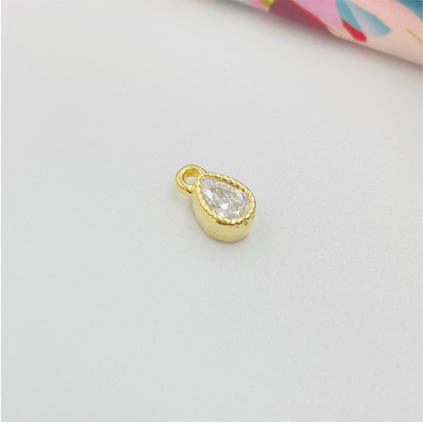 FO974 Colgante Punto de Luz Gota Borde Acanalado 5x3 mm mas argollita Figura Baño Oro Figuras Bañadas hecho de Bronce Bañado en Oro 18K Joyas Bañadas en Oro