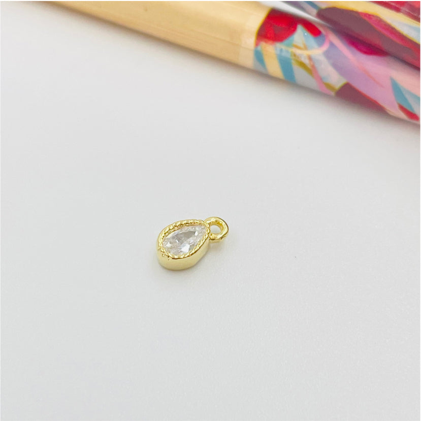FO974 Colgante Punto de Luz Gota Borde Acanalado 5x3 mm mas argollita Figura Baño Oro Figuras Bañadas hecho de Bronce Bañado en Oro 18K Joyas Bañadas en Oro