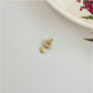 FO977 Colgante símbolo Sexo Femenino con micro circones 9x5 mm más argollita Figura Baño Oro Figuras Bañadas hecho de Bronce Bañado en Oro 18K Joyas Bañadas en Oro