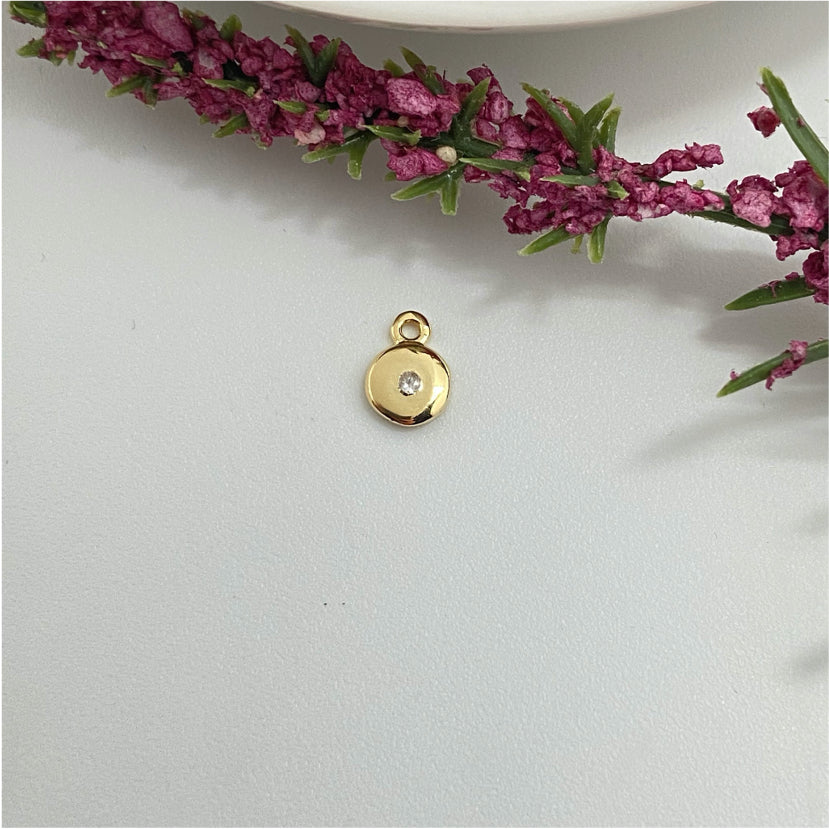 FO978 Colgante con Micro Circón central Diá 5 mm mas argollita Figura Baño Oro Figuras Bañadas hecho de Bronce Bañado en Oro 18K Joyas Bañadas en Oro