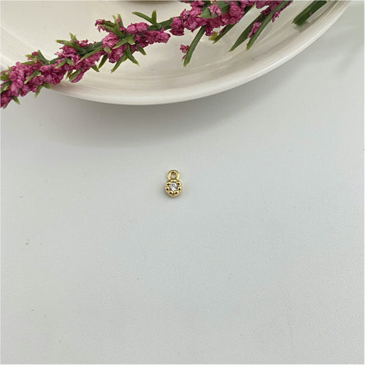 FO979 Colgante Punto de Luz Mini Flor Circón Cristal Diá. 4 mm Espesor 2 mm mas argollita Figura Baño Oro Figuras Bañadas hecho de Bronce Bañado en Oro 18K Joyas Bañadas en Oro