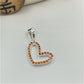 FP775 Colgante Corazón Ladeado Calado con circones Color Naranjo 16x13 mm mas Balier Figura Baño Plata Figuras Bañadas en Oro y Plata hecho de Bronce Bañado en Plata 50 ml