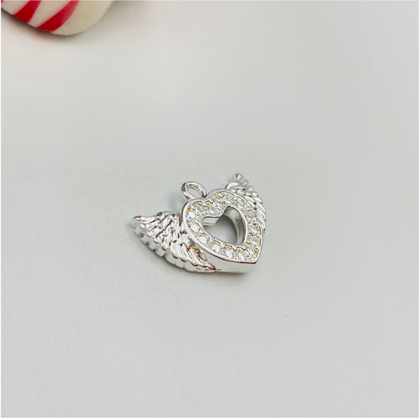 FP836 Colgante Corazón Alitas 10x16 mm incluye argollita Figura Baño Plata Figuras Bañadas en Oro y Plata hecho de Bronce Bañado en Plata 50 ml Joyas Bañadas en Plata
