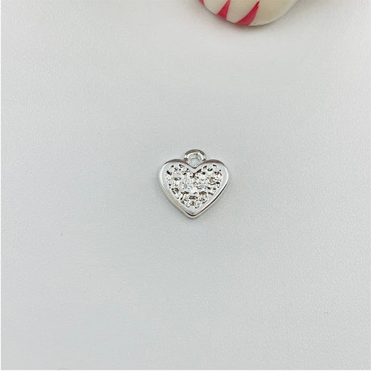 FP841 Colgante Corazón con Puntitos en el Centro 9x9 mm incluye argollita Figura Baño Plata Figuras Bañadas en Oro y Plata hecho de Bronce Bañado en Plata 50 ml Joyas Bañadas en Plata