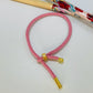 PO006 Pulsera Hilo Espesor 3 mm largo 15-18 cm Diámetro ajustable Pulsera Baño Oro Pulsera hecho de Hilo y Bronce Bañado en Oro Pulsera Baño Oro Color Rosado