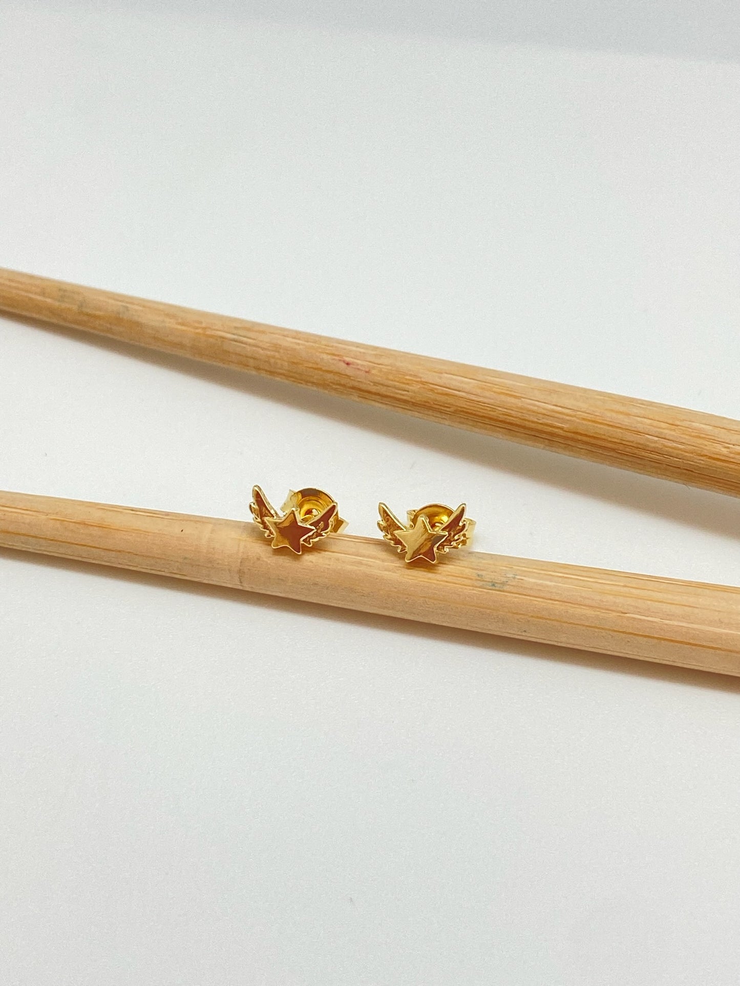 XO297 Aro mini estrella alada 5x7 mm Aro Baño Oro