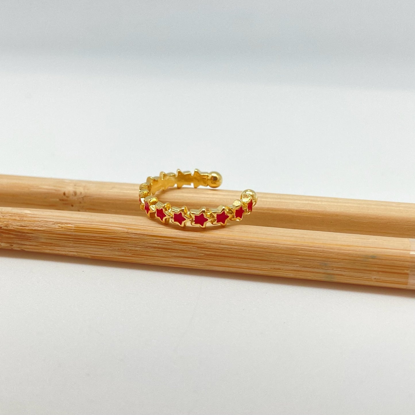 WO62 Anillo Ajustable Estrellas con resina color Dia. 18 mm ancho 3 mm Anillo Baño Oro