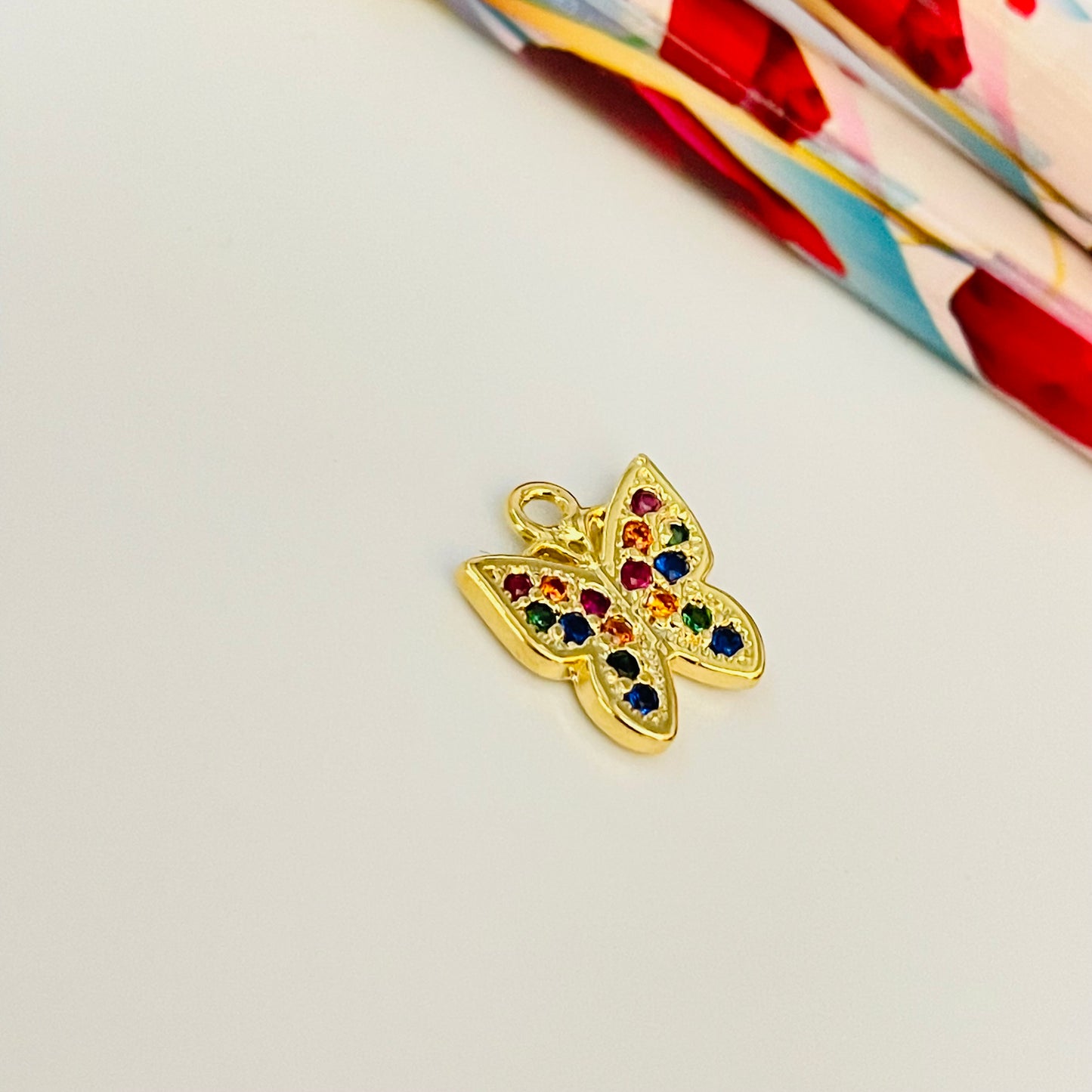 FO915 Colgante Mariposa con circones multicolor 10x10 mm Figura Baño Oro