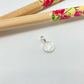 FP1023 Colgante medalla estrella en relieve con resina color dia. 7 mm mas valier fijo 4 mm perforación 3 mm Figura Baño Plata