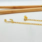 XO303 Cuff argollita con 1 bolita y aro punto de luz 4 mm borde rutilado unidos por cadena de 18 cm largo Aro Baño Oro